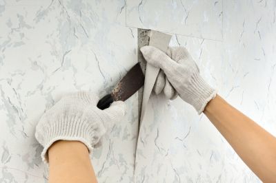 Professional Wallpaper Installer at Work